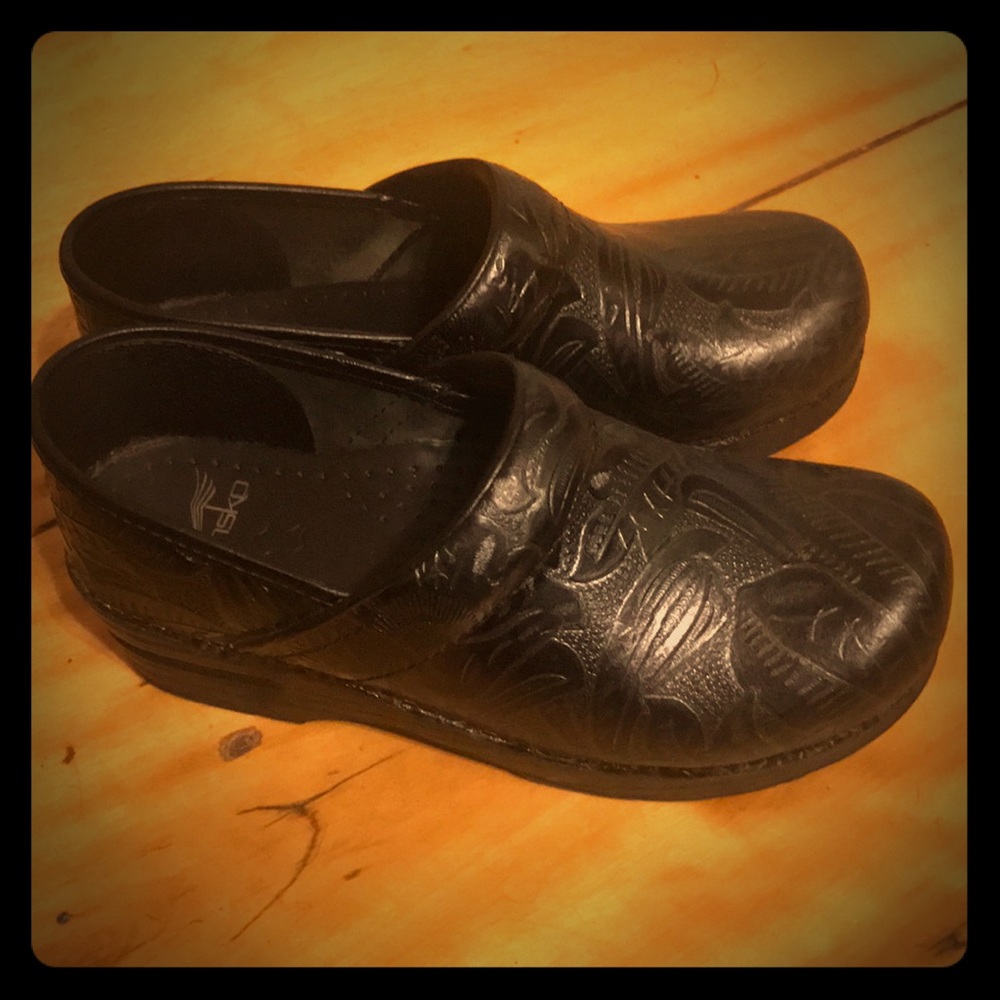 Nearly new black dansko size 38.